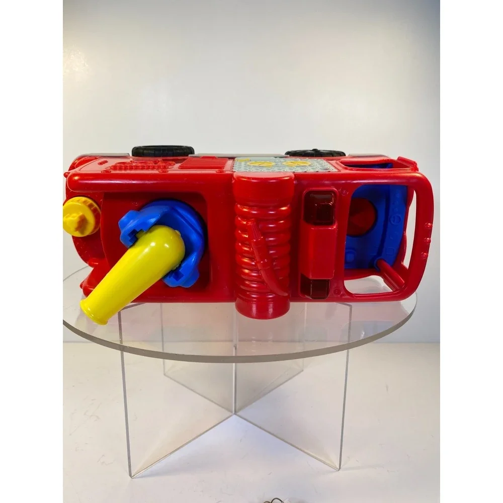 Fisher Price Little People Musical Red Fire Truck Lights Water Hose and Figures